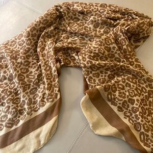 Oversized Wrap/Pareo Scarf in Abstract Print with Brown stripe on Tan Border.